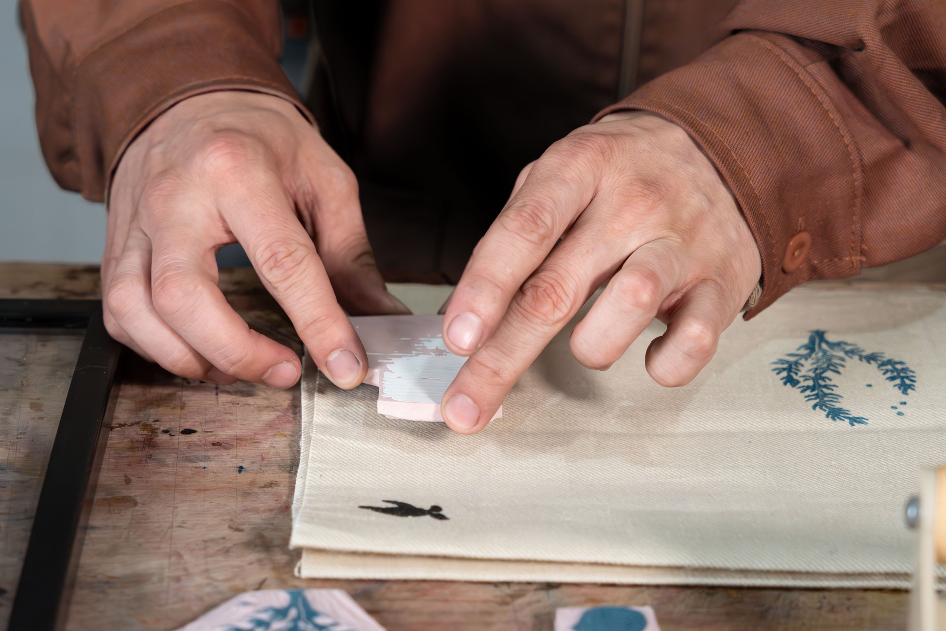 Careful handmade textile printing with rubber stamps